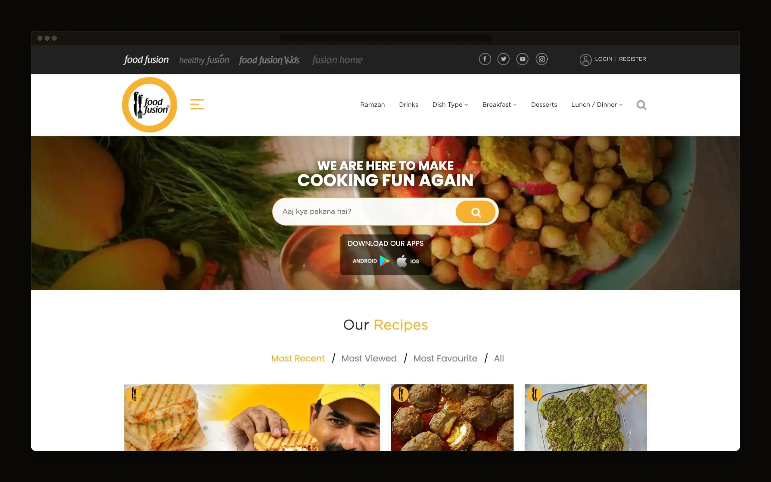 Recipe platform homepage with a search field over a food photograph, app download links, and the start of a recipe grid below.