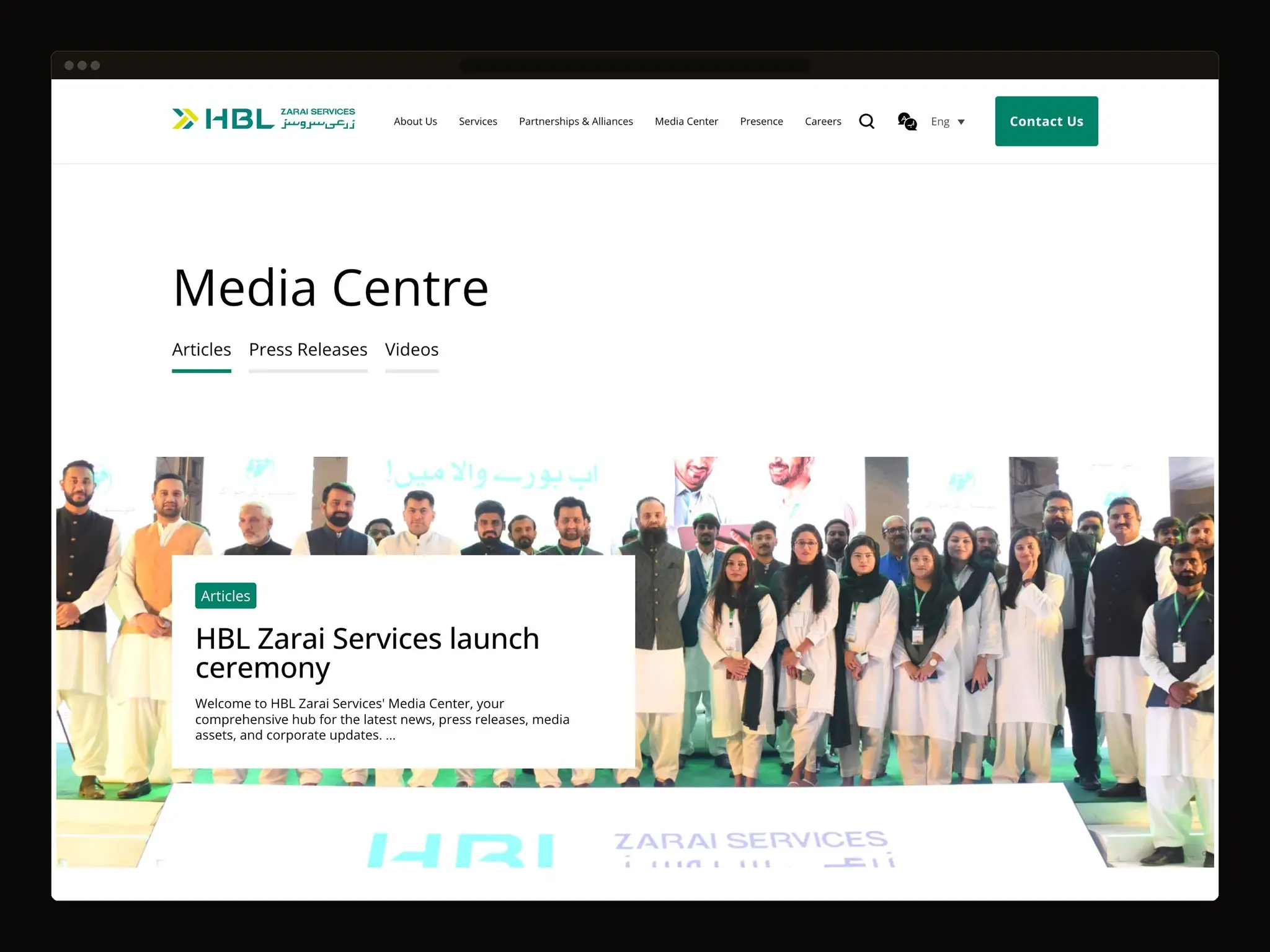 Media centre archive with tabs for articles, press releases and videos, and a featured launch ceremony article over a group photograph.